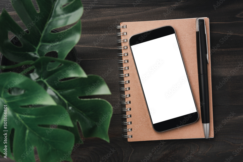Poster creative workspace modern dark office desk with blank smartphone and pen on notebook,mockup topview
