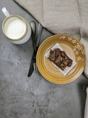 Homemade Chewvy Brownie with a cup of milk
