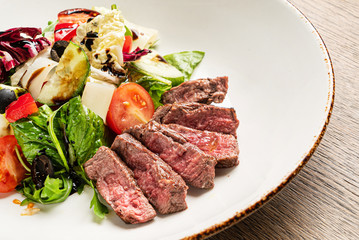 grilled meat with fresh salad