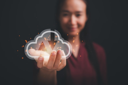 woman holding icon cloud computing network and data information in hand.Cloud computing and technology concept.