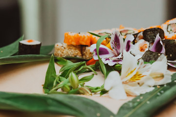 sushi in the woman in the restaurant. close up