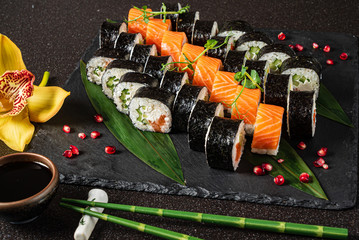 tasty sushi on the black background