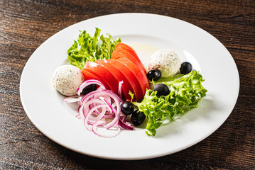 salad with fresh vegetables and mozzarella
