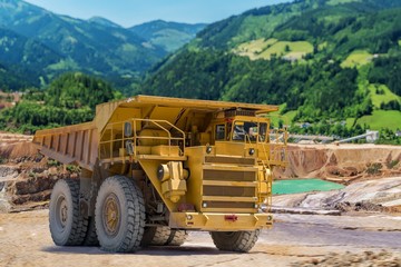 Yellow mining truck in iron ore in Austria.