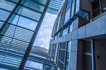 Obraz premium modern office building,blue toned image,china.