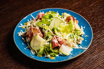 tasty salad with parma and cheese
