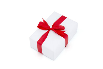 White gift box and red ribbon in season Christmas and new year isolated on white background, luxury present for birthday or anniversary with surprise in package for happy, holiday concept.