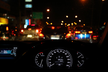 light of traffic jam on night city street
