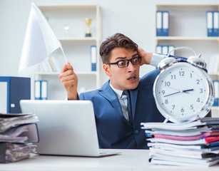 Businessman throwing white flag and giving up