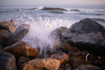 Waves crashing on rocks