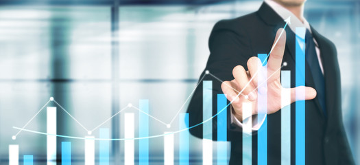 Businessman plan graph growth increase of chart positive indicators in his business