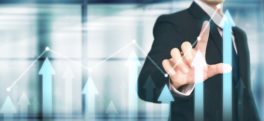 Businessman plan graph growth increase of chart positive indicators in his business