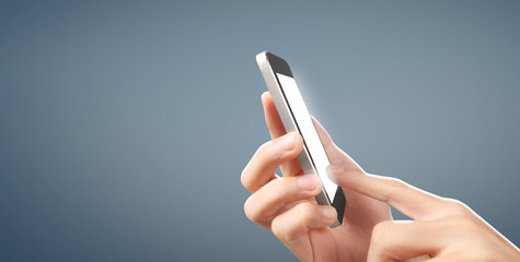 Man hand holding smartphone device and touching screen