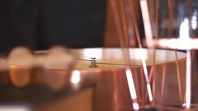 Concept of time, close up of clock ticking, vintage feel with black and copper colors