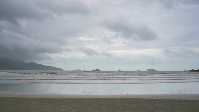 Chai Chet Beach on Koh Chang island in slow motion. Bad weather cloudy rainy day