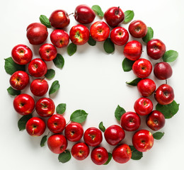 Frame made of fresh ripe apples on white background