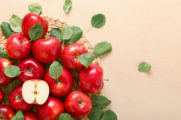 Fresh ripe apples on color background