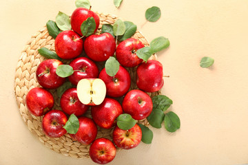 Fresh ripe apples on color background