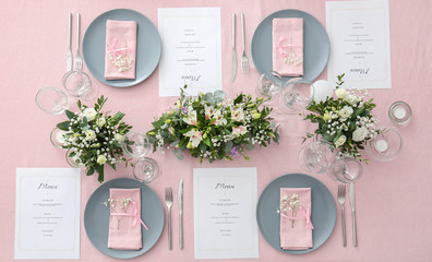 Beautiful table setting for wedding celebration in restaurant