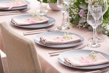 Beautiful table setting for wedding celebration in restaurant