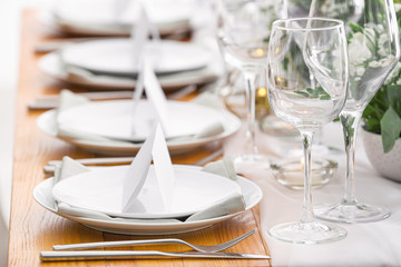 Beautiful table setting for wedding celebration in restaurant