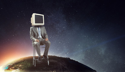 Monitor headed businessman. Mixed media