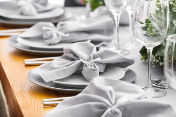 Beautiful table setting for wedding celebration in restaurant