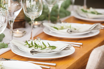 Beautiful table setting for wedding celebration in restaurant