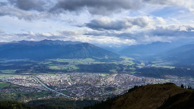 Epic time-lapse view over the city of Innsbruck and the alps mountains from Hafelekar on the Nordkette, Austria