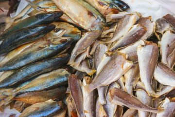 Dry fishes stack for selling in the market.