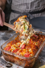 Thanksgiving delicious baked cheese pie with vegetables. Vertical shot. Close-up