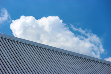 oriental Japanese style roof with blue sky as background.