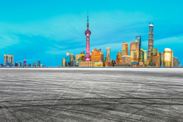 Fototapeta premium Night architectural landscape and asphalt road in Shanghai