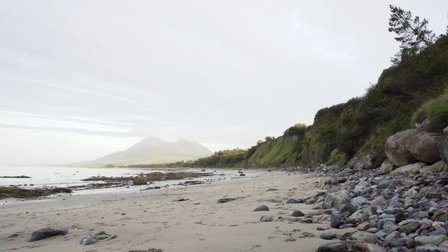 Old Head Beach in Ireland after big storm with Croagh Patrick in Background