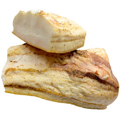 Pieces of crude fat of pork are isolated on a white background.