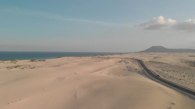 Dune desert Aerial drone footage of the coastal area Dunas de Corralejo, Fuerteventura, Canary Islands, Spain.