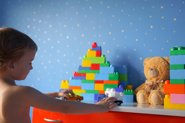boy playing with toys