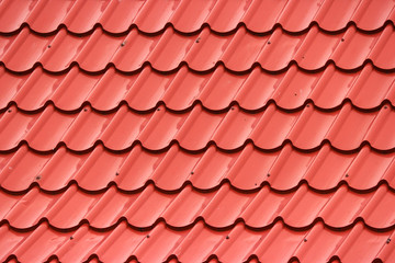 Thai red ceramic roof wall background.