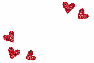 Valentine's Day background - heart shaped confetti arranged like hearts over white background.