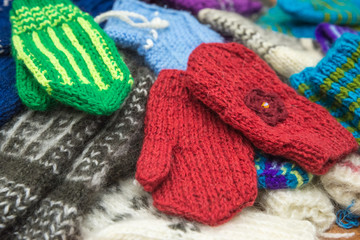Background from wool products. Socks, mittens.