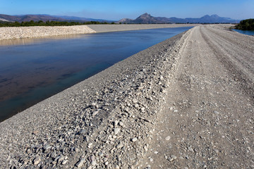 The construction of the Ashta dam on the Drini River, Albania