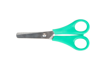 Used scissors with green handle