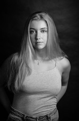 Naklejka premium Portrait of a beautiful young woman. Toned in black and white.