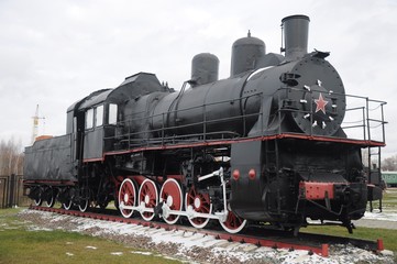 Fototapeta na wymiar Old black steam train from the museum of steam locomotives