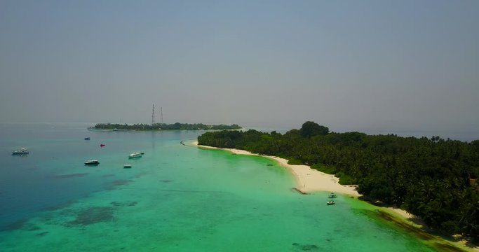 aerial, foggy morning over the small tropical islands, Maldives