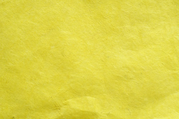 antique colored paper background texture. Colour of paper yellow