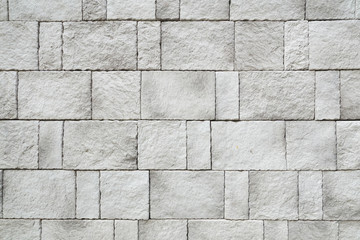 A grey brick wall background