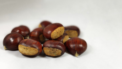 Lots of Parede class chestnuts isolated with white background