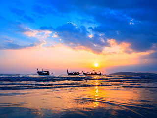 Traditional long-tail boat on the beach in Thailand
