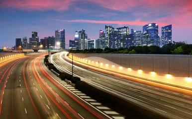 Fototapeta na wymiar Movement of car light with Singapore cityscape skyline during sunset